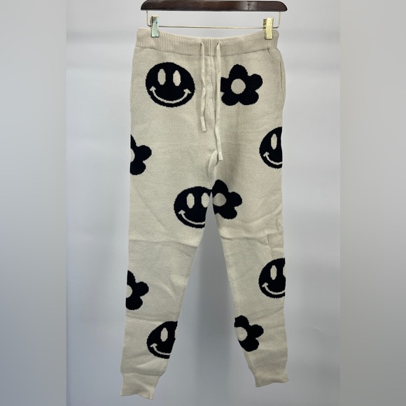 Women’s Dressed in LALA Off White and Black Smiley Face Cropped Jogger Pants - Picture 4 of 8